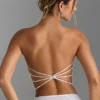 Nanaka Bandeau-Oberteil mit Verzierungen und Rückenriemen in Weiß Nanaka Bandeau-Oberteil mit Verzierungen und Rückenriemen in Weiß