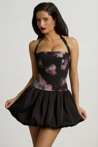Nanala Neckholder-Minikleid mit Schnürung und Bubble-Saum in Schwarz mit Blumenprint