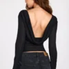 Nari – Transparentes Jersey-Oberteil mit langen Ärmeln und rückenfreiem Ausschnitt in Schwarz Nari – Transparentes Jersey-Oberteil mit langen Ärmeln und rückenfreiem Ausschnitt in Schwarz