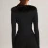 Nesta Playsuit mit Kunstfellbesatz in Schwarz Nesta Playsuit mit Kunstfellbesatz in Schwarz