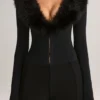 Nesta Playsuit mit Kunstfellbesatz in Schwarz Nesta Playsuit mit Kunstfellbesatz in Schwarz