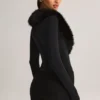 Nesta Playsuit mit Kunstfellbesatz in Schwarz Nesta Playsuit mit Kunstfellbesatz in Schwarz