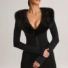 Nesta Playsuit mit Kunstfellbesatz in Schwarz Nesta Playsuit mit Kunstfellbesatz in Schwarz