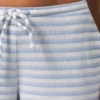 Niedrige Hose aus geripptem Jersey mit blauen Streifen Niedrige Hose aus geripptem Jersey mit blauen Streifen