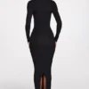 Noa – Langärmliges Maxikleid mit tiefem Ausschnitt aus geripptem Modal in Schwarz Noa – Langärmliges Maxikleid mit tiefem Ausschnitt aus geripptem Modal in Schwarz