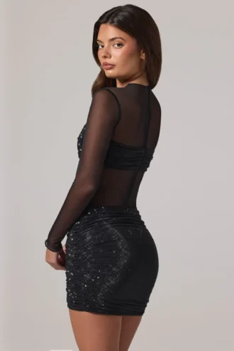 Noel transparentes, verziertes Minikleid mit hohem Kragen und langen Ärmeln in Schwarz