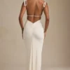 Noelia Maxikleid aus strukturiertem Jersey mit Rückenausschnitt in Elfenbein Noelia Maxikleid aus strukturiertem Jersey mit Rückenausschnitt in Elfenbein