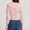 Noemy – Transparenter Cardigan aus Spitze mit Kunstfellbesatz in Rosa Noemy – Transparenter Cardigan aus Spitze mit Kunstfellbesatz in Rosa