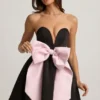 Norina Minikleid mit Schleifendetail und Korsettoptik in Schwarz Norina Minikleid mit Schleifendetail und Korsettoptik in Schwarz
