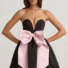 Norina Minikleid mit Schleifendetail und Korsettoptik in Schwarz Norina Minikleid mit Schleifendetail und Korsettoptik in Schwarz