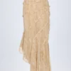 Novina Maxirock mit Rüschen und asymmetrischem Schnitt in Beige mit Print Novina Maxirock mit Rüschen und asymmetrischem Schnitt in Beige mit Print