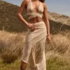 Novina Maxirock mit Rüschen und asymmetrischem Schnitt in Beige mit Print Novina Maxirock mit Rüschen und asymmetrischem Schnitt in Beige mit Print