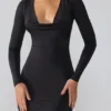 Oakley Slinky Jersey Langarm-Minikleid mit tiefem Ausschnitt in Schwarz Oakley Slinky Jersey Langarm-Minikleid mit tiefem Ausschnitt in Schwarz