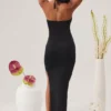Oceane Maxikleid mit Cut-outs, Neckholder und bodenlangem Schnitt in Schwarz Oceane Maxikleid mit Cut-outs, Neckholder und bodenlangem Schnitt in Schwarz