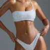 Oh Polly Bademode: HOTFIX Edition verziertes Ein-Schulter-Bandeau-Bikinioberteil in Weiß Oh Polly Bademode: HOTFIX Edition verziertes Ein-Schulter-Bandeau-Bikinioberteil in Weiß