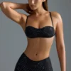 Oh Polly Bademode: HOTFIX Edition verziertes Micro-Bikini-Oberteil in Schwarz Oh Polly Bademode: HOTFIX Edition verziertes Micro-Bikini-Oberteil in Schwarz