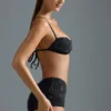 Oh Polly Bademode: HOTFIX Edition verziertes Micro-Bikini-Oberteil in Schwarz Oh Polly Bademode: HOTFIX Edition verziertes Micro-Bikini-Oberteil in Schwarz