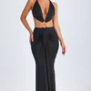 Omarosa Maxikleid mit Metallverzierungen und Cut-outs im Neckholder-Stil in Schwarz Omarosa Maxikleid mit Metallverzierungen und Cut-outs im Neckholder-Stil in Schwarz