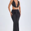 Omarosa Maxikleid mit Metallverzierungen und Cut-outs im Neckholder-Stil in Schwarz Omarosa Maxikleid mit Metallverzierungen und Cut-outs im Neckholder-Stil in Schwarz