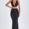 Omarosa Maxikleid mit Metallverzierungen und Cut-outs im Neckholder-Stil in Schwarz Omarosa Maxikleid mit Metallverzierungen und Cut-outs im Neckholder-Stil in Schwarz