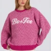Oversize-Pullover mit gestricktem Logo in Magenta-Pink Oversize-Pullover mit gestricktem Logo in Magenta-Pink