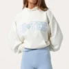 Oversized-Hoodie mit Applikation in Milch Oversized-Hoodie mit Applikation in Milch