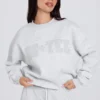 Oversized-Sweatshirt mit Rundhalsausschnitt in Grau meliert Oversized-Sweatshirt mit Rundhalsausschnitt in Grau meliert