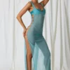 Pacifica Maxikleid mit Perlenverzierung und Cut-outs in Türkis Pacifica Maxikleid mit Perlenverzierung und Cut-outs in Türkis