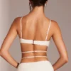 Parma Verziertes Crop-Top mit Bügeln und Trägern in Weiß Parma Verziertes Crop-Top mit Bügeln und Trägern in Weiß