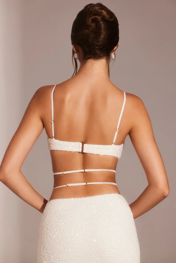 Parma Verziertes Crop-Top mit Bügeln und Trägern in Weiß Parma Verziertes Crop-Top mit Bügeln und Trägern in Weiß