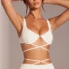 Parma Verziertes Crop-Top mit Bügeln und Trägern in Weiß Parma Verziertes Crop-Top mit Bügeln und Trägern in Weiß