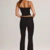 Patsy Modal-Hose mit mittlerer Leibhöhe und ausgestelltem Bein in Schwarz Patsy Modal-Hose mit mittlerer Leibhöhe und ausgestelltem Bein in Schwarz