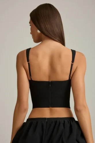 Pearla Korsett-Oberteil mit Cut-outs und Schleifendetail in Schwarz