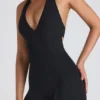 Pema Modal-Jumpsuit mit Spitzenbesatz, Cut-outs und ausgestelltem Schnitt in Schwarz Pema Modal-Jumpsuit mit Spitzenbesatz, Cut-outs und ausgestelltem Schnitt in Schwarz