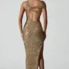 Persephone Verziertes asymmetrisches Cut-Out-Kleid in Gold Persephone Verziertes asymmetrisches Cut-Out-Kleid in Gold
