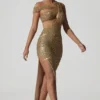 Persephone Verziertes asymmetrisches Cut-Out-Kleid in Gold Persephone Verziertes asymmetrisches Cut-Out-Kleid in Gold