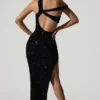 Persephone – Verziertes, asymmetrisches Cut-Out-Kleid in Schwarz Persephone – Verziertes, asymmetrisches Cut-Out-Kleid in Schwarz