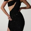 Persephone – Verziertes, asymmetrisches Cut-Out-Kleid in Schwarz Persephone – Verziertes, asymmetrisches Cut-Out-Kleid in Schwarz