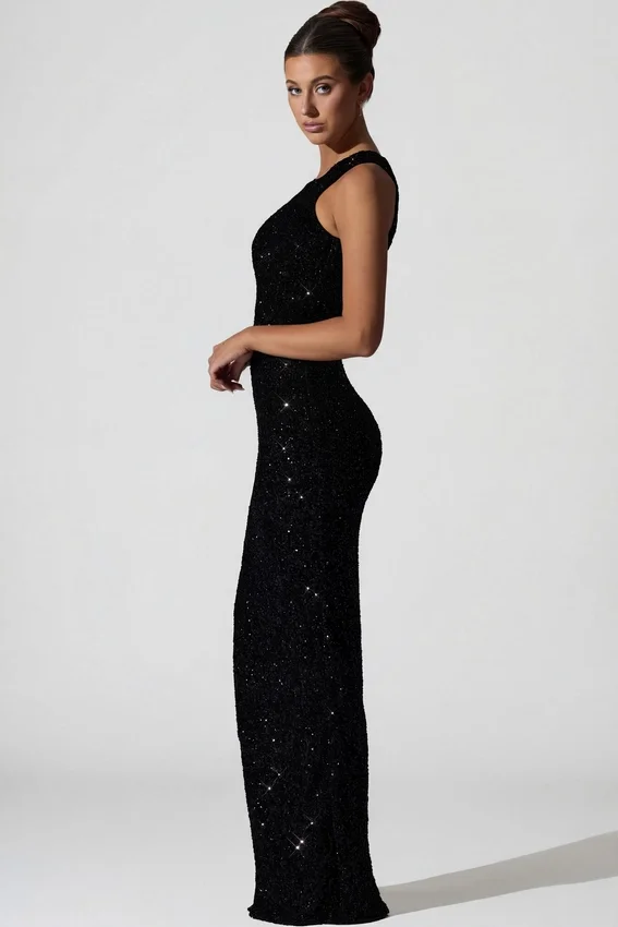Persephone – Verziertes, asymmetrisches Cut-Out-Kleid in Schwarz Persephone – Verziertes, asymmetrisches Cut-Out-Kleid in Schwarz