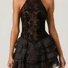 Petalia Minikleid mit Rüschen und Neckholder in Schwarz Petalia Minikleid mit Rüschen und Neckholder in Schwarz