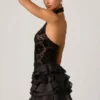 Petalia Minikleid mit Rüschen und Neckholder in Schwarz Petalia Minikleid mit Rüschen und Neckholder in Schwarz