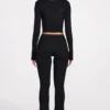 Philippa Modal-Hose mit mittlerer Leibhöhe und ausgestelltem Bein in Schwarz Philippa Modal-Hose mit mittlerer Leibhöhe und ausgestelltem Bein in Schwarz