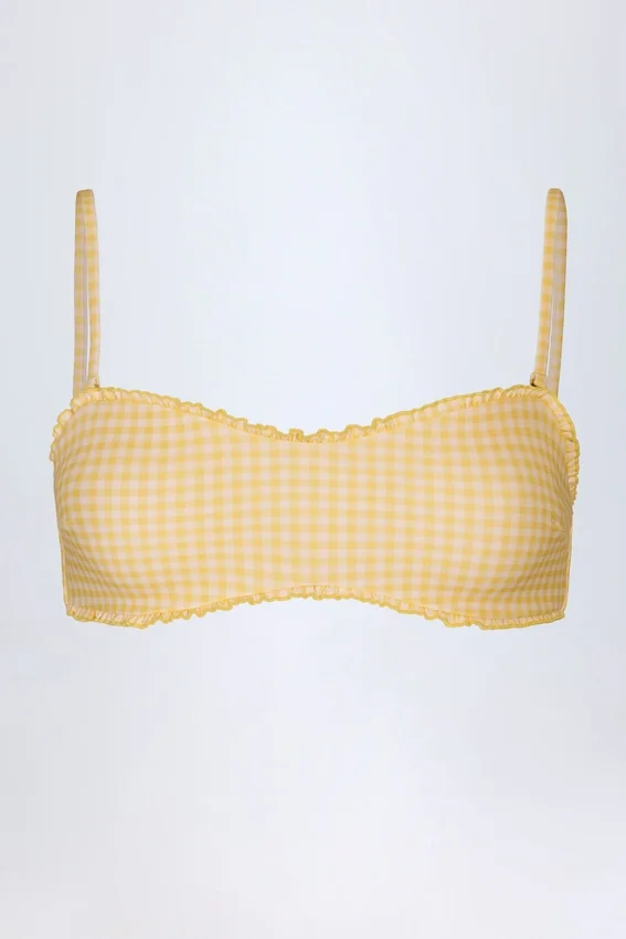 Portbou Bandeau-Bikinioberteil mit Rüschen in gelbem Gingham Portbou Bandeau-Bikinioberteil mit Rüschen in gelbem Gingham