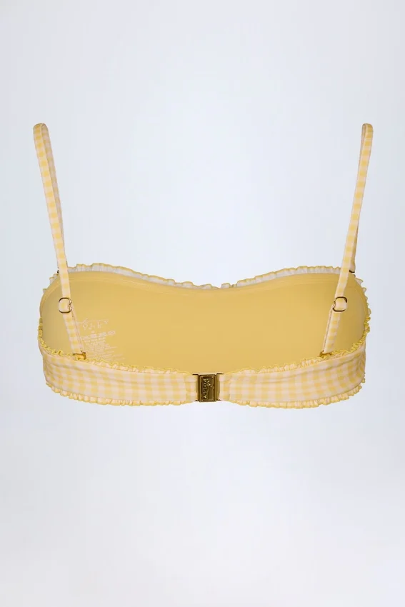 Portbou Bandeau-Bikinioberteil mit Rüschen in gelbem Gingham Portbou Bandeau-Bikinioberteil mit Rüschen in gelbem Gingham