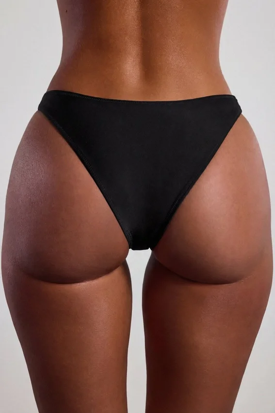 Praslin Bandeau-Bikinioberteil mit Perlenverzierung in Schwarz Praslin Bandeau-Bikinioberteil mit Perlenverzierung in Schwarz
