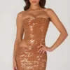 Rania Minikleid mit Cut-outs und Verzierungen in Bronze Rania Minikleid mit Cut-outs und Verzierungen in Bronze