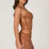Rania Minikleid mit Cut-outs und Verzierungen in Bronze Rania Minikleid mit Cut-outs und Verzierungen in Bronze