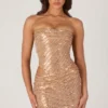 Rania Minikleid mit Cut-outs und Verzierungen in Gold Rania Minikleid mit Cut-outs und Verzierungen in Gold