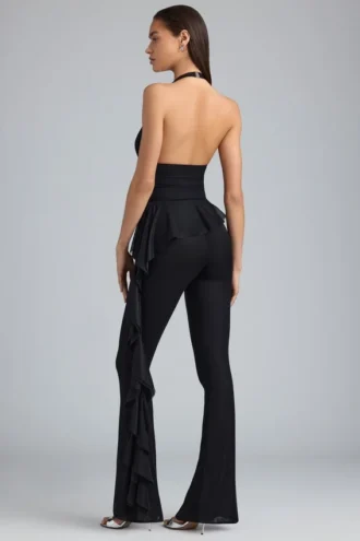 Reese Metallic-Rüschen-Hose mit niedriger Leibhöhe und ausgestelltem Bein in Schwarz