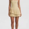 Rosaria Asymmetrisches, mehrlagiges Neckholder-Minikleid in Pastellgelb